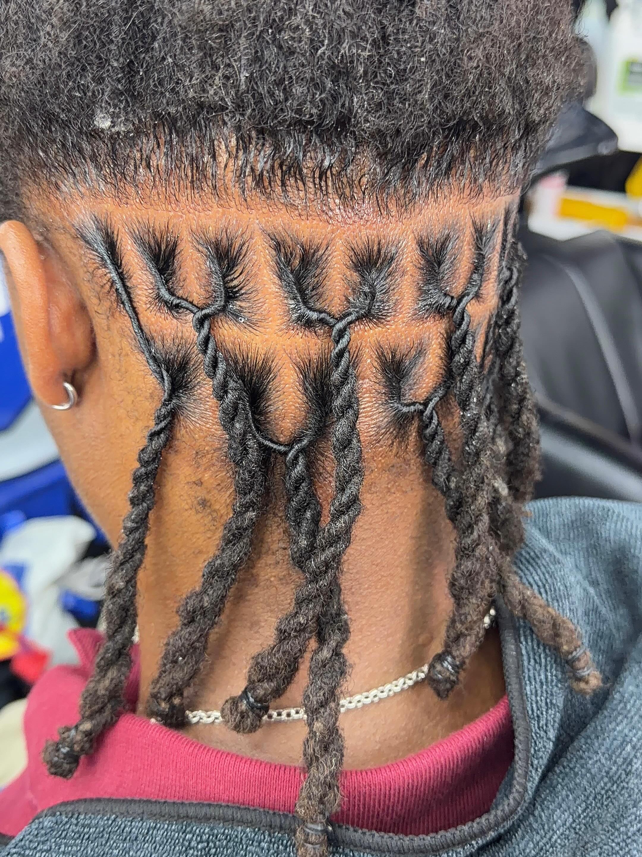Close-up of styled locs